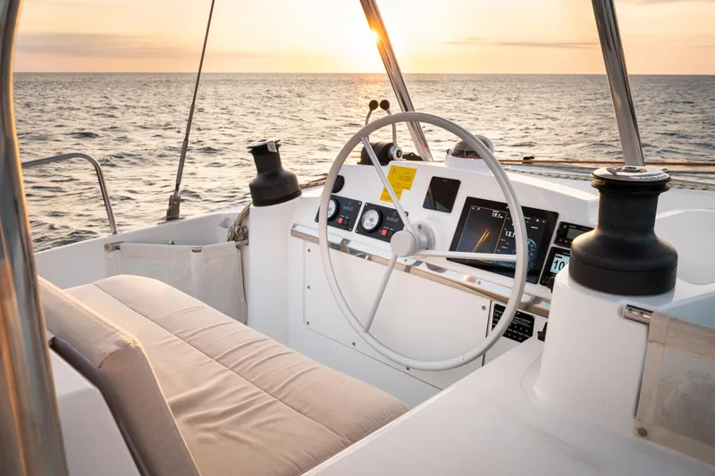  Yacht Photos Pics Cockpit of 2026 Bali 4.4 yacht at sunset, featuring modern navigation equipment.