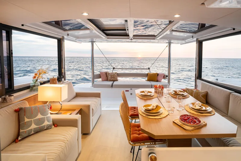 Yacht Photos Pics Luxurious Bali 4.4 yacht interior, 2026 model, featuring elegant dining area with ocean view.