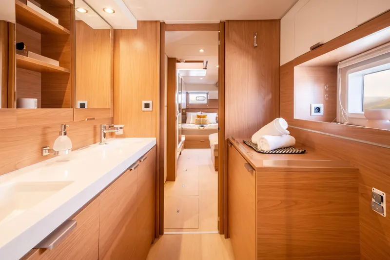  Yacht Photos Pics Luxurious interior of 2026 Bali 4.4 yacht featuring modern wood finishes and elegant design.