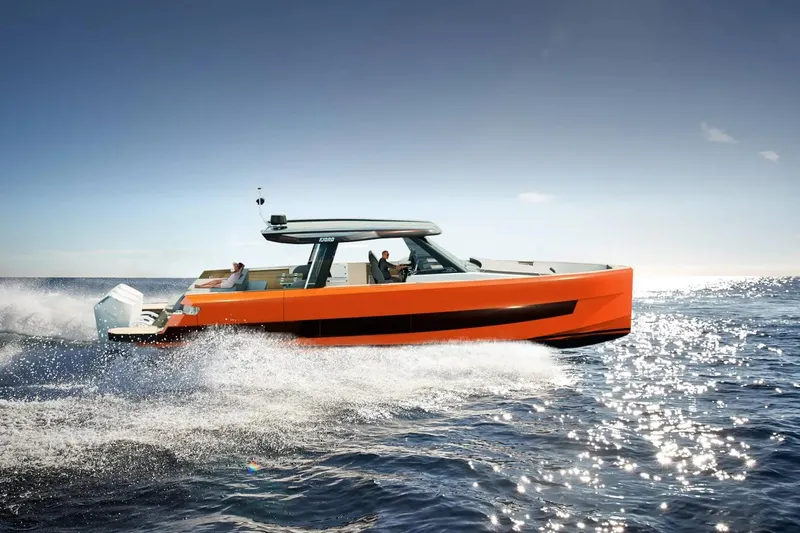  Yacht Photos Pics 2026 Fjord 490 OPEN boat cruising on sparkling ocean waters.