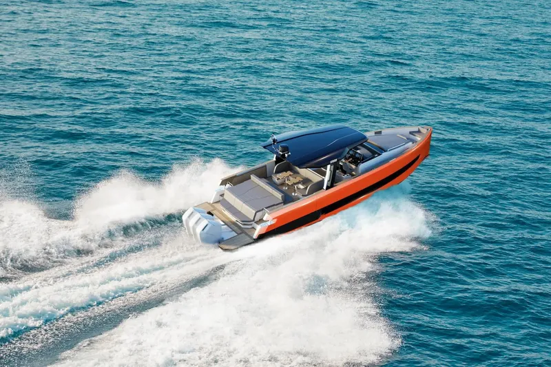  Yacht Photos Pics 2026 Fjord 490 OPEN speedboat cruising on open water, showcasing sleek design and performance.