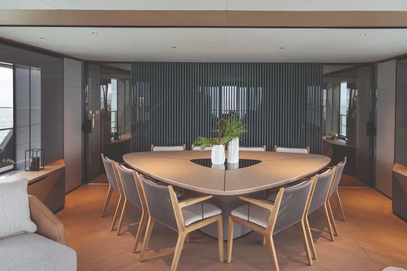  Yacht Photos Pics Luxurious dining area on 2026 Azimut GRANDE 30M yacht with modern decor and elegant furnishings.