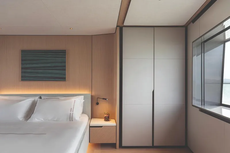  Yacht Photos Pics Luxurious bedroom interior of 2026 Azimut GRANDE 30M yacht with modern design elements.