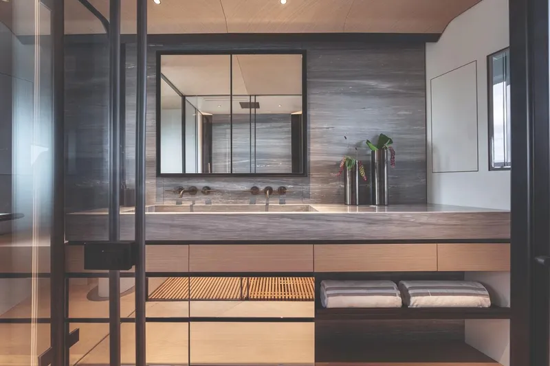  Yacht Photos Pics Luxurious bathroom interior on Azimut GRANDE 30M yacht, featuring modern design and elegant fixtures.