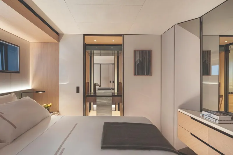  Yacht Photos Pics Luxurious bedroom interior of 2026 Azimut GRANDE 30M yacht, featuring modern design and elegant furnishings.