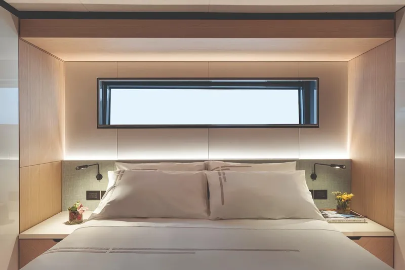  Yacht Photos Pics Luxurious bedroom interior of 2026 Azimut GRANDE 30M yacht with modern design elements.