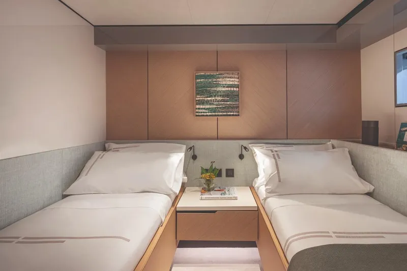  Yacht Photos Pics Luxurious twin bedroom in 2026 Azimut GRANDE 30M yacht, featuring modern decor and cozy ambiance.