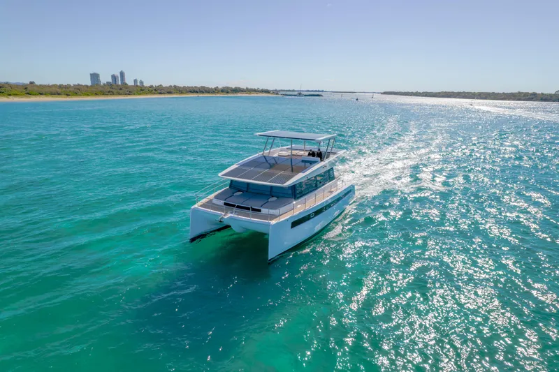  Yacht Photos Pics Sunpower 44 VIP yacht cruising on clear blue water, 2022 model.