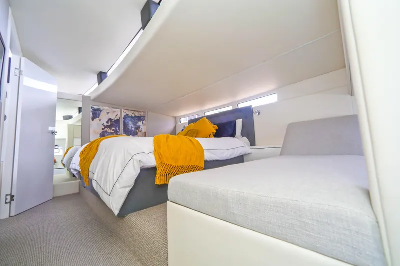  Yacht Photos Pics Luxurious Sunpower 44 VIP yacht bedroom interior, featuring modern design and cozy bedding, 2022 model.