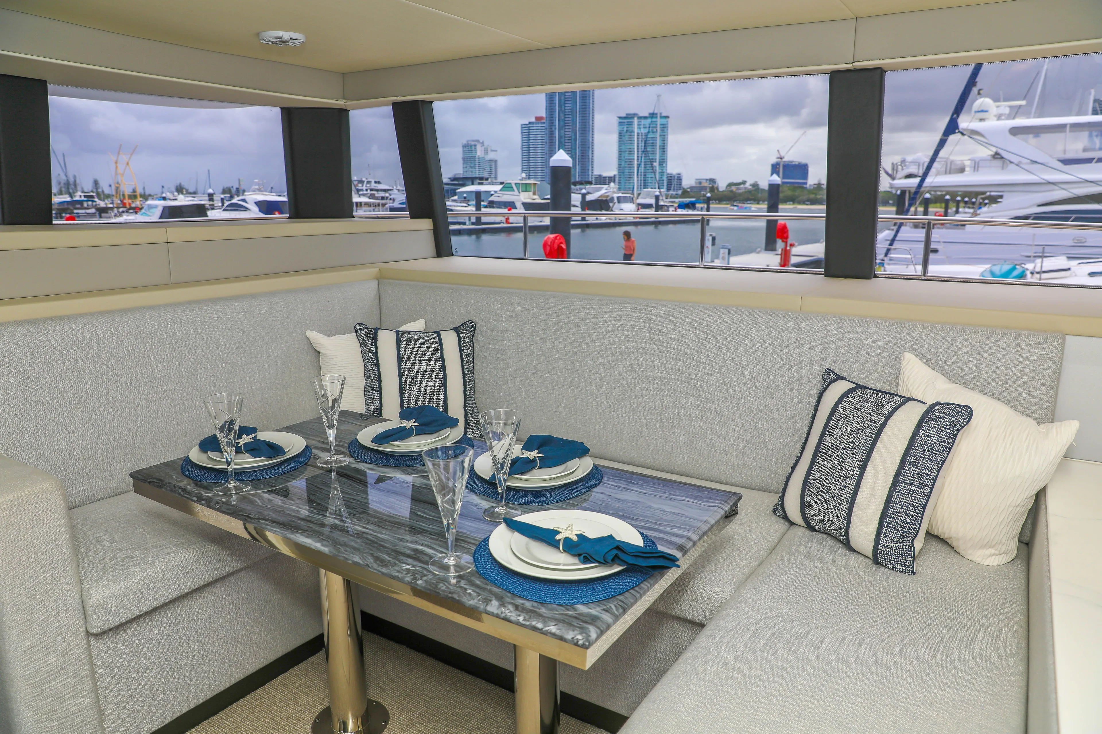  Yacht Photos Pics Luxurious Sunpower 44 VIP yacht interior dining area with elegant table setting, 2022 model.