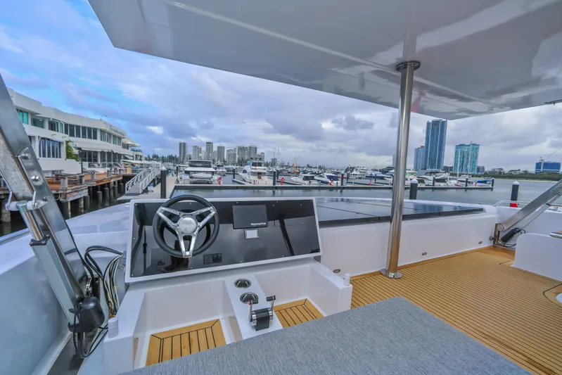  Yacht Photos Pics Sunpower 44 VIP yacht helm with marina view, 2022 model, modern design.