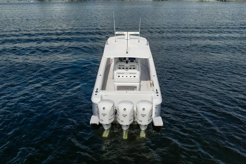  Yacht Photos Pics 2015 Intrepid 375 Center Console boat with triple engines on open water.