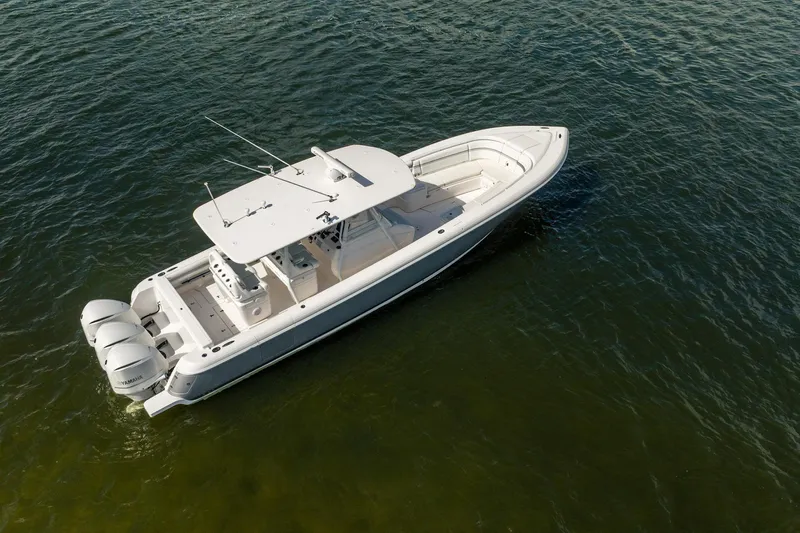  Yacht Photos Pics 2015 Intrepid 375 Center Console boat on calm water, aerial view.