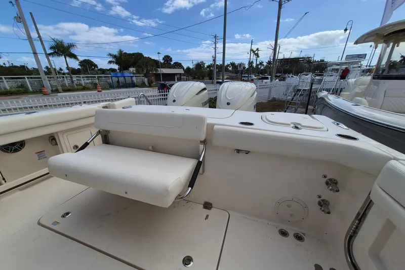 306 - 628 Yacht Photos Pics 2026 Grady-White Freedom 307 boat interior with seating and controls.