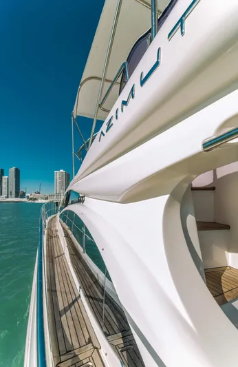 Prime Time Yacht Photos Pics 2012 Azimut 48 Flybridge yacht with sleek design, docked near city skyline.