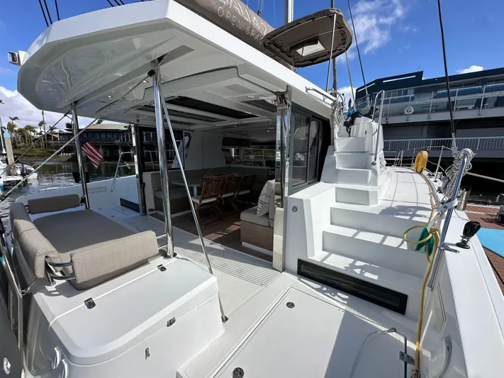 After You Yacht Photos Pics 2023 Bali 4.2 yacht with spacious deck and modern seating area.