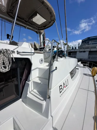 After You Yacht Photos Pics 2023 Bali 4.2 catamaran with sleek design, docked under clear blue skies.