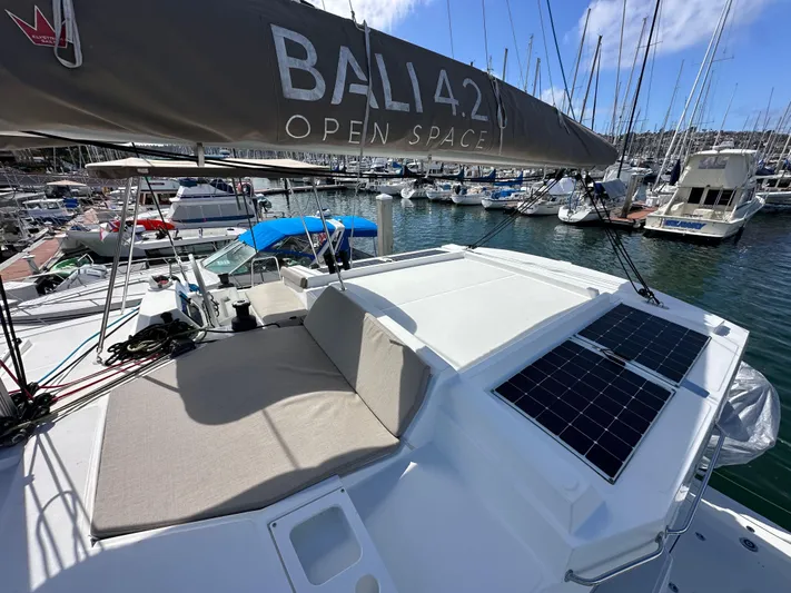 After You Yacht Photos Pics 2023 Bali 4.2 catamaran with solar panels docked in marina.