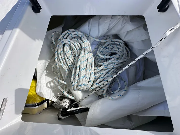 After You Yacht Photos Pics Rope and sail storage in 2023 Bali 4.2 yacht compartment.