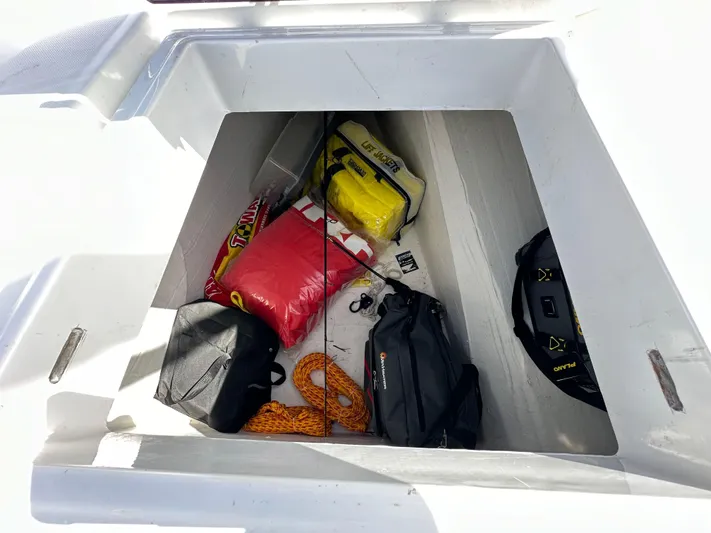 After You Yacht Photos Pics Storage compartment of 2023 Bali 4.2 boat with bags and equipment.