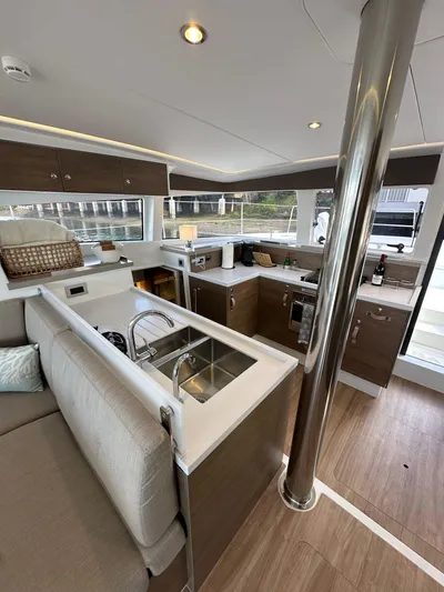 After You Yacht Photos Pics Modern kitchen interior of 2023 Bali 4.2 yacht with sleek design and ample natural light.