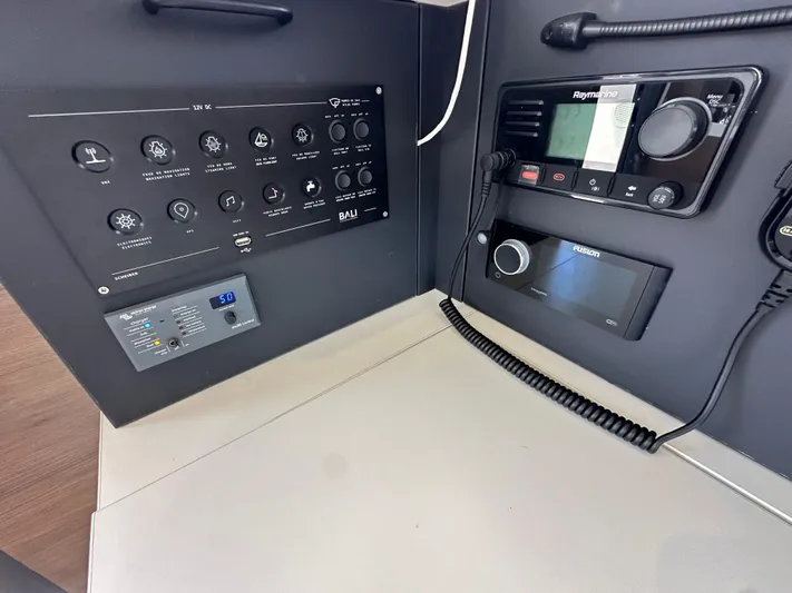 After You Yacht Photos Pics Control panel of a 2023 Bali 4.2 yacht with navigation and communication equipment.