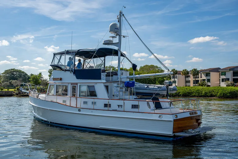 Yacht Photos Pics 2002 Grand Banks 42 Classic yacht cruising on a sunny day.