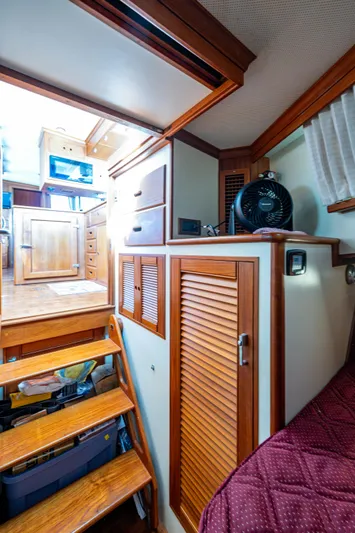  Yacht Photos Pics Interior of 2002 Grand Banks 42 Classic yacht with wooden stairs and cabinetry.