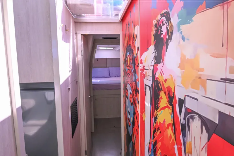  Yacht Photos Pics Colorful interior hallway of 2017 Leopard 51 Powercat with vibrant wall art.