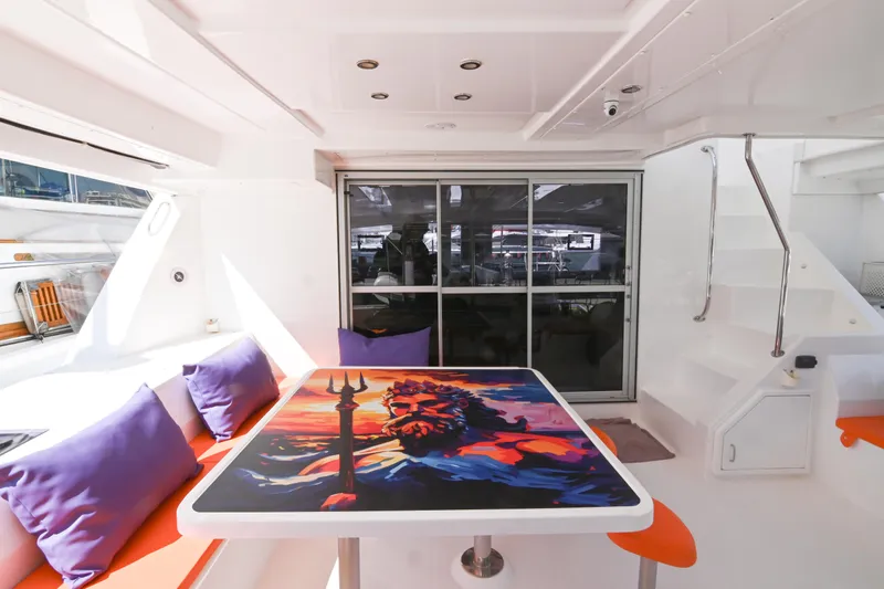  Yacht Photos Pics Leopard 51 Powercat 2017 yacht interior with vibrant table art and modern seating.