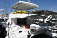 2017 Leopard 51 Powercat docked at marina under clear blue sky.
