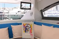 Leopard 51 Powercat 2017 interior with colorful artwork and marina view.