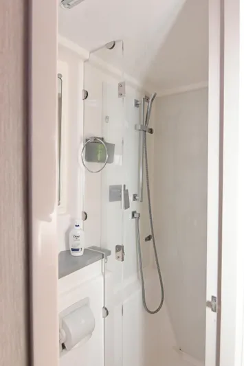  Yacht Photos Pics 2017 Leopard 51 Powercat bathroom with modern shower and sleek fixtures.