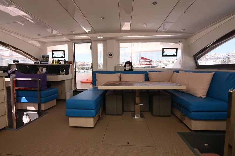  Yacht Photos Pics Interior of 2017 Leopard 51 Powercat yacht with blue seating and modern design.