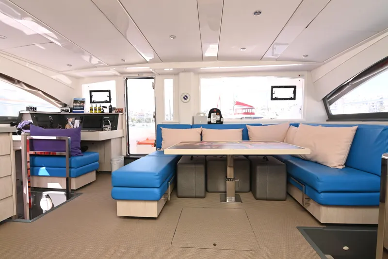  Yacht Photos Pics Luxurious interior of 2017 Leopard 51 Powercat with blue seating and modern design.