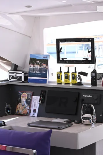  Yacht Photos Pics Leopard 51 Powercat 2017 interior with navigation equipment and Greek Waters Pilot book.