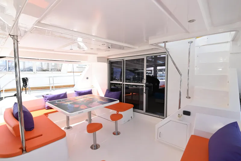  Yacht Photos Pics Luxurious Leopard 51 Powercat 2017 interior with vibrant seating and modern design.