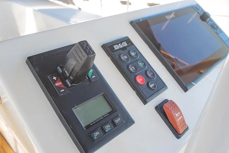  Yacht Photos Pics Control panel of a 2021 Bavaria C45 yacht with navigation and control systems.