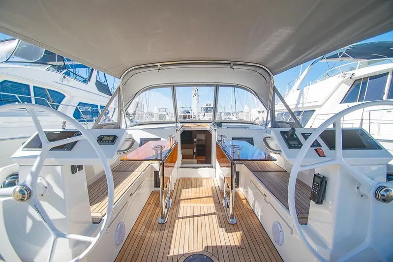  Yacht Photos Pics Interior view of 2021 Bavaria C45 yacht cockpit with dual steering wheels.