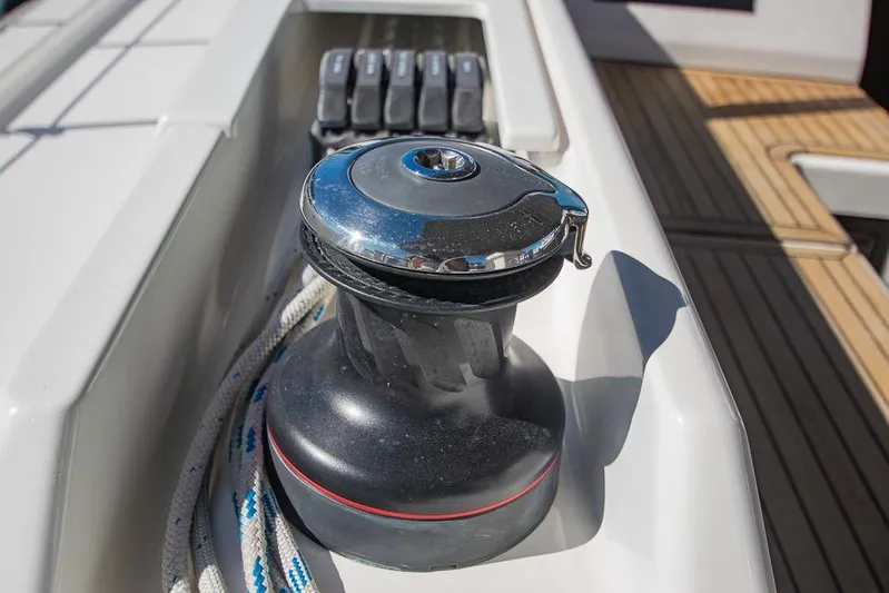  Yacht Photos Pics Winch on 2021 Bavaria C45 yacht deck with rope and control panel.