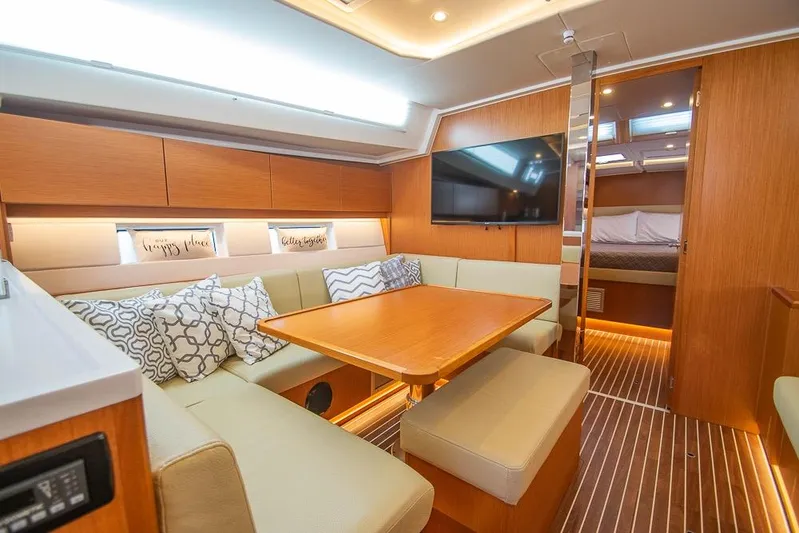  Yacht Photos Pics Luxurious interior of 2021 Bavaria C45 yacht with cozy seating and modern amenities.