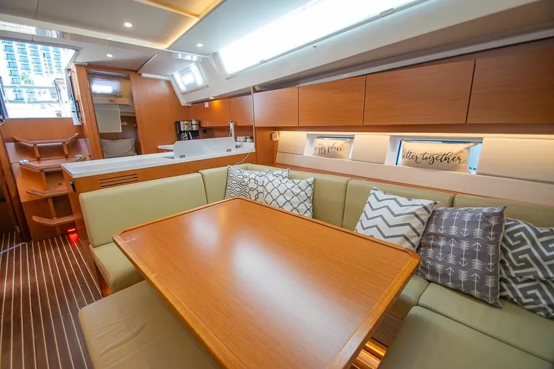  Yacht Photos Pics Luxurious interior of 2021 Bavaria C45 yacht with cozy seating and modern design.