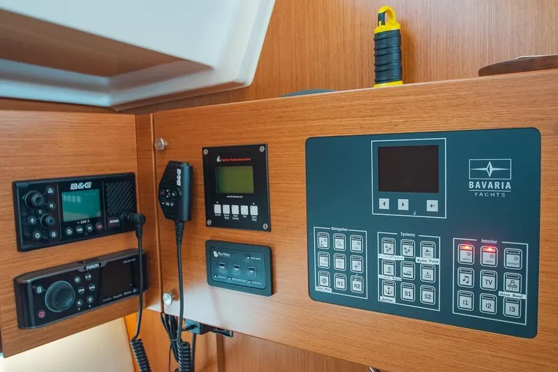  Yacht Photos Pics Control panel of a 2021 Bavaria C45 yacht with navigation and system displays.