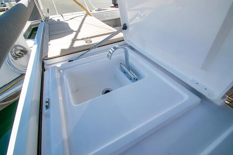  Yacht Photos Pics Outdoor sink on 2021 Bavaria C45 yacht deck, featuring modern design and functionality.