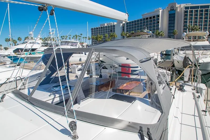  Yacht Photos Pics 2021 Bavaria C45 yacht docked at marina, featuring sleek design and spacious deck area.