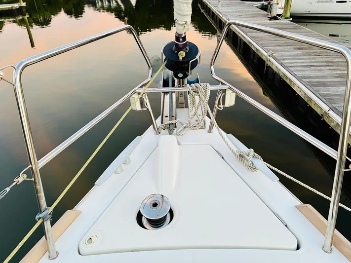  Yacht Photos Pics Bow of 2017 Beneteau Oceanis 45 yacht docked at marina.