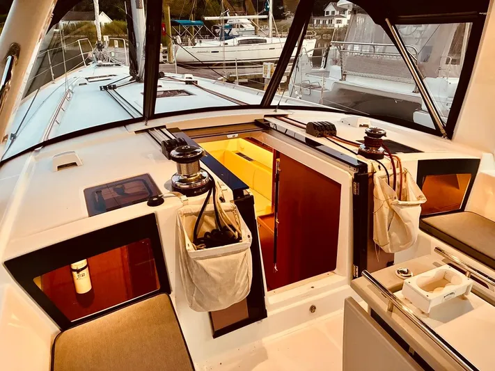  Yacht Photos Pics Beneteau Oceanis 45 yacht cockpit, 2017 model, featuring winches and open cabin entrance.