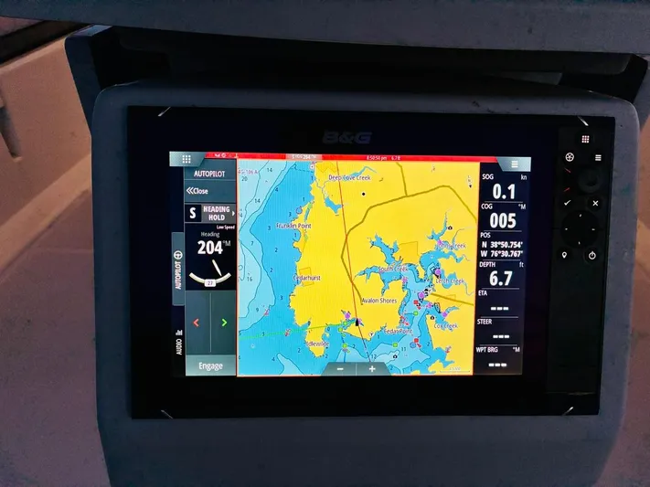  Yacht Photos Pics Navigation display on a 2017 Beneteau Oceanis 45, showing map and autopilot settings.