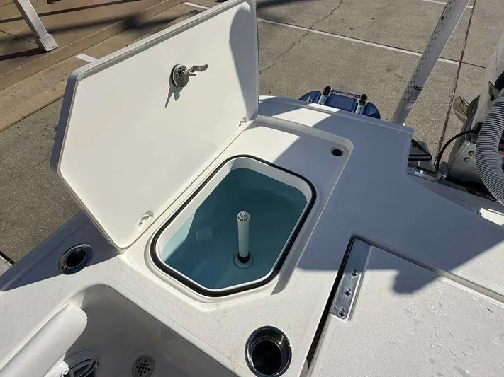 Black Label Marine Yacht Photos Pics Caymas 28 HB 2026 boat with open storage compartment.