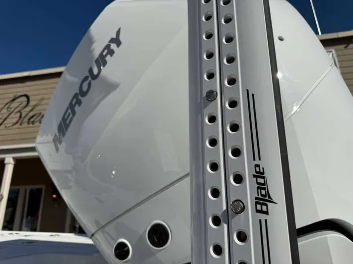 Black Label Marine Yacht Photos Pics Close-up of a Mercury engine on a 2026 Caymas 28 HB boat.